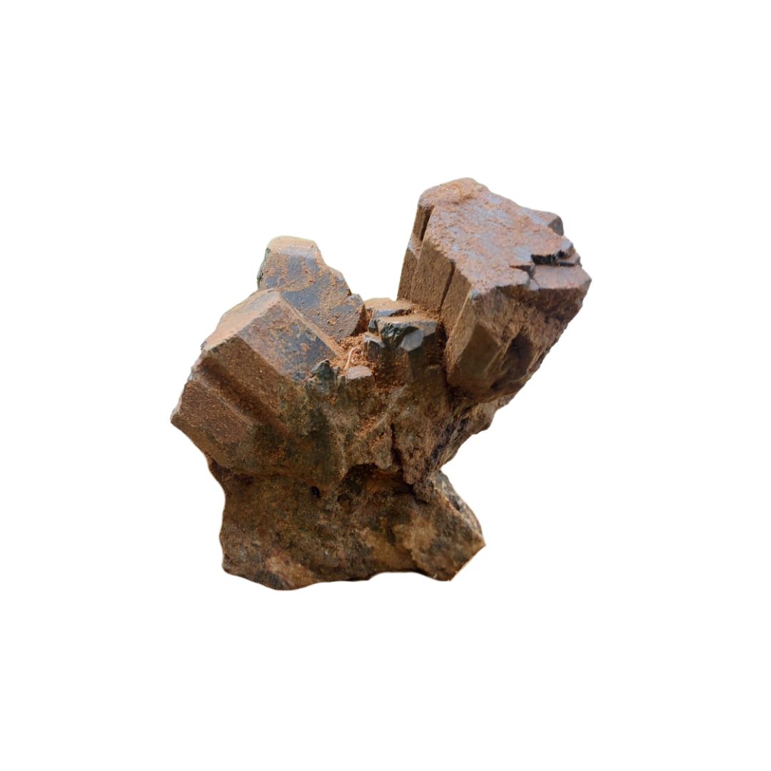 Diopside, a green brown mineral on a white background